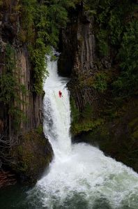 kayaking off a waterfall