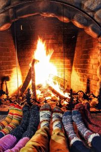 by the fire with friends