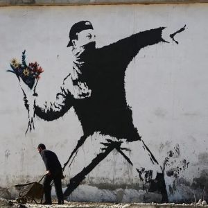 flower-thrower-by-banksy-in-betlehem